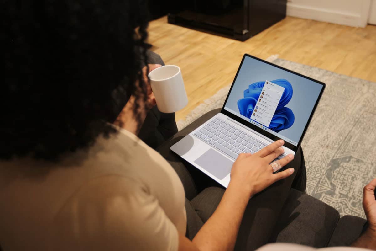 Complete 2026 guide to buying Windows product keys with a key card and magnifying glass on a desk
