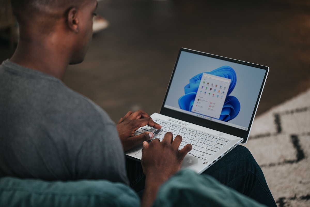 Windows 10 end of life fading out while Windows 11 logo shines brightly urging users to upgrade now